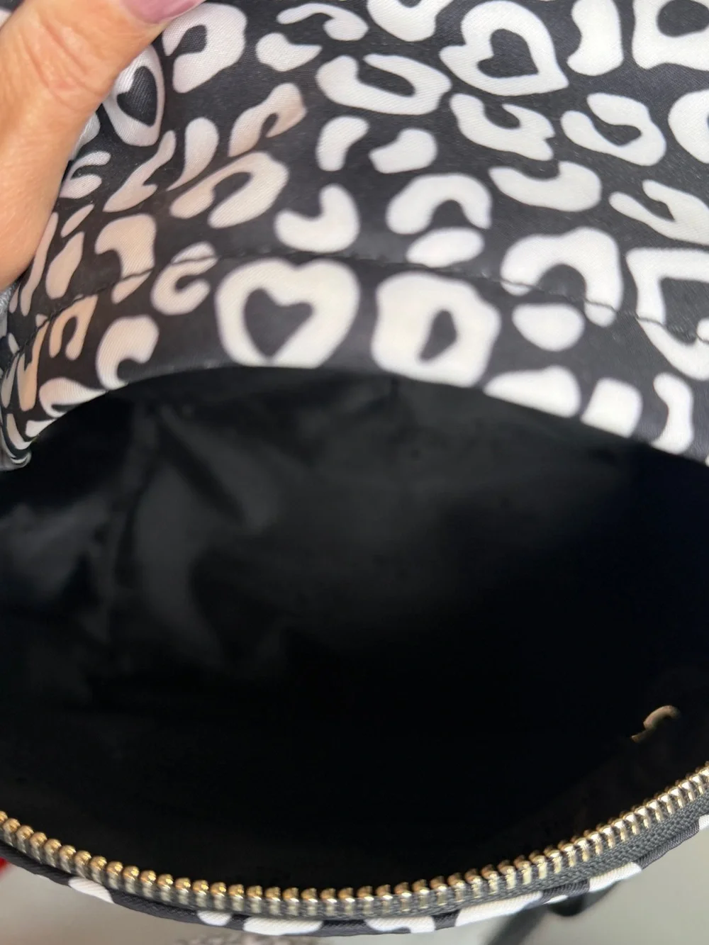 kate spade Black and White Leopard-Print Mini Backpack with cosmetics bag